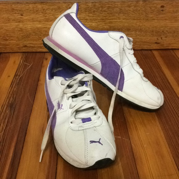 white and purple pumas